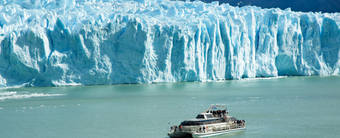 Small boat near the Perito Moreno Glacier in Patagonia, Argentina.