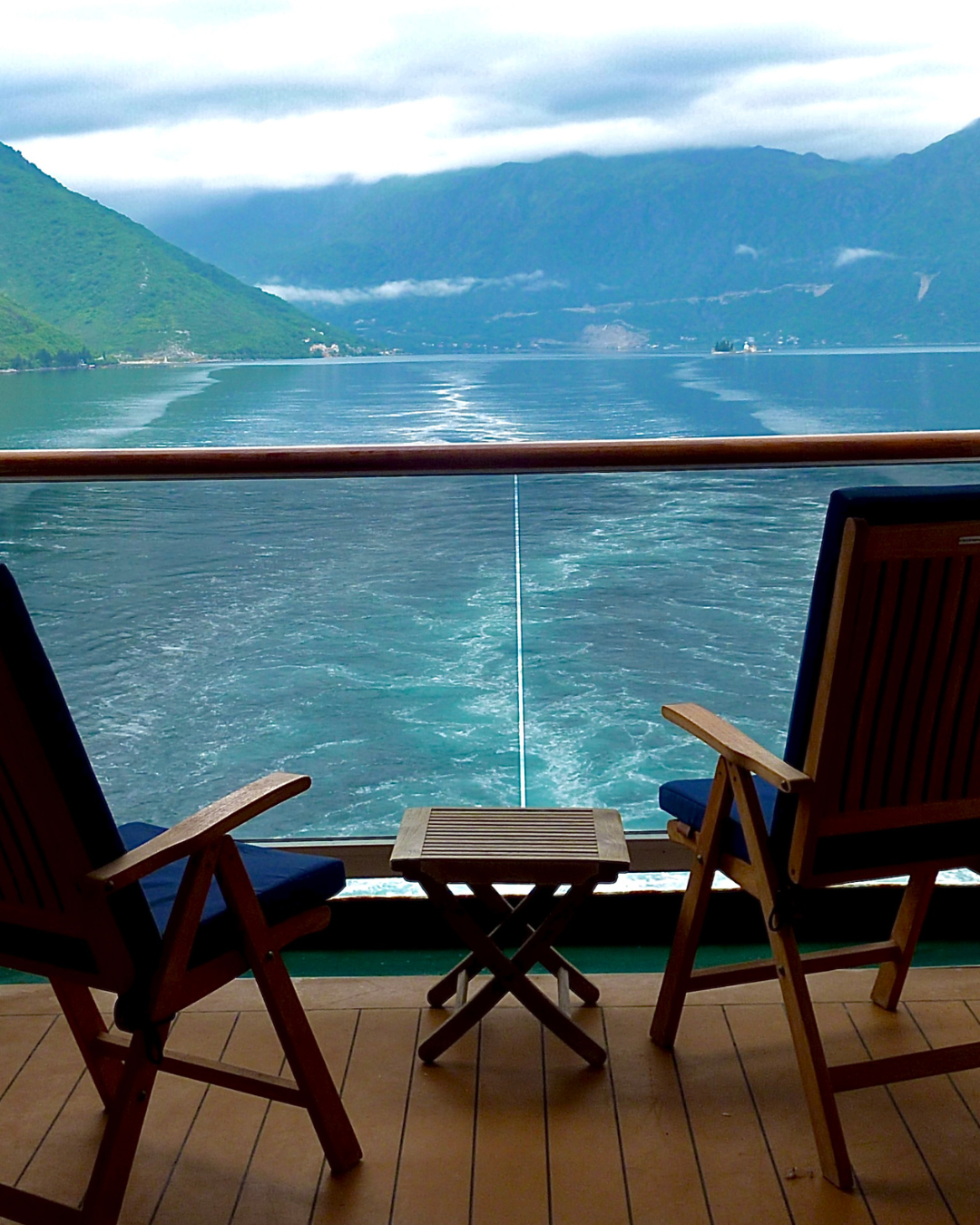 Private balcony overlooking Alaska's Inside Passage from a cruise ship